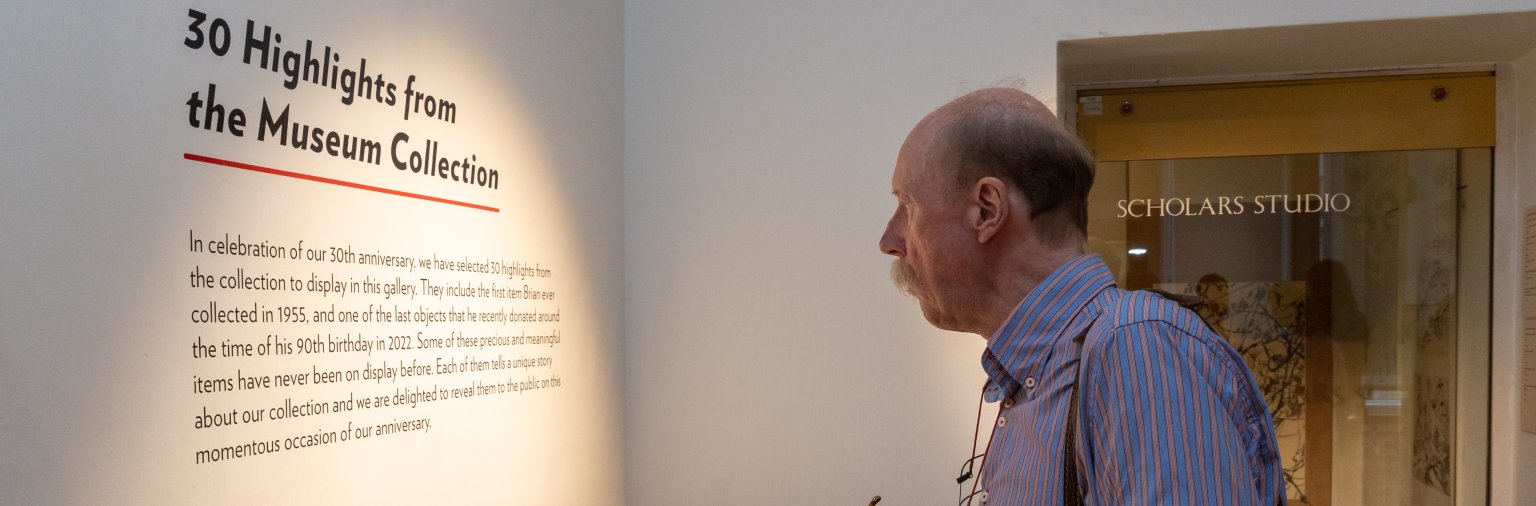 Image: A man looking at a display